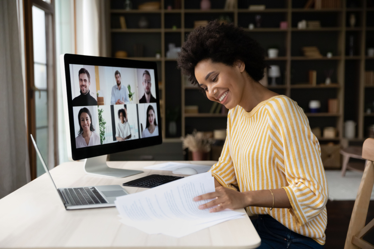 female remote worker in digital meeting